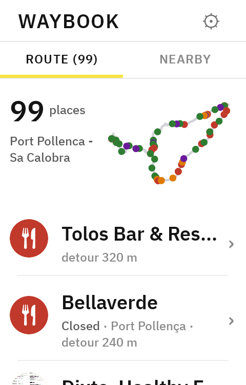 The Waybook ROUTE tab on a Karoo: 99 places on a Port Pollença to Sa Calobra loop, the whole route drawn above the list with a coloured coin for every place along it